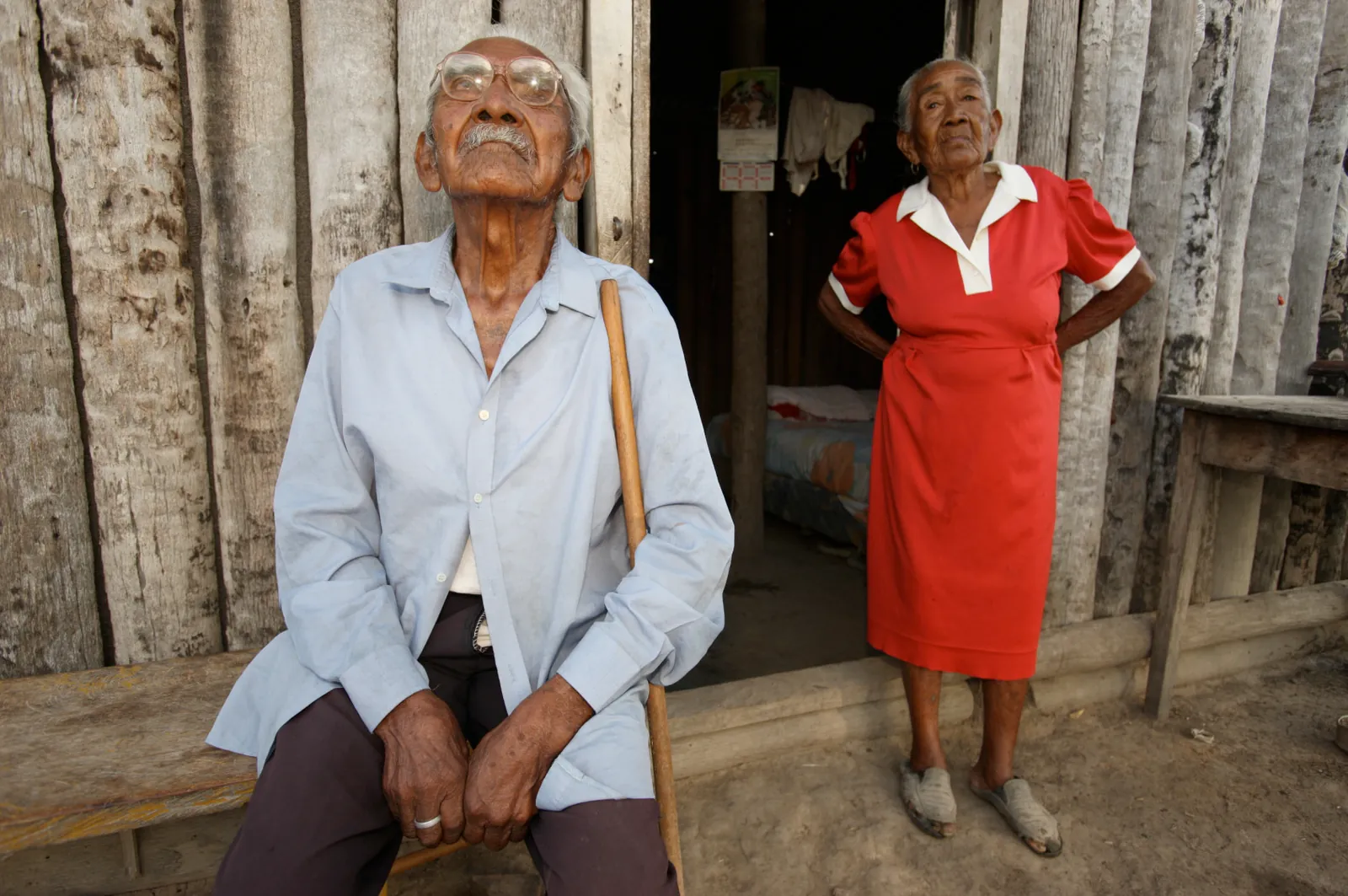Two elders at the door of their house in Paraguay